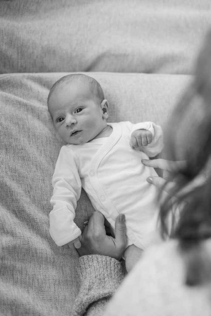 Bay Area in-home newborn photography session documenting a growing family in their home