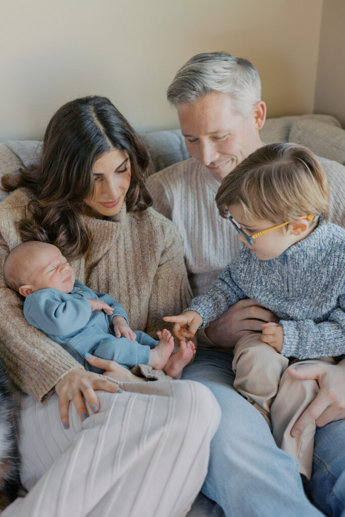 In-home newborn photography session in Alameda with a Bay Area family welcoming their second child