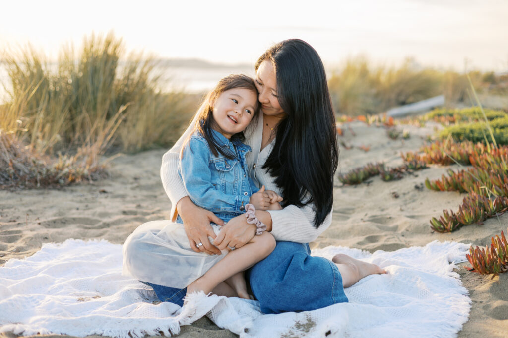 mom kisses toddler during east bay family photography session