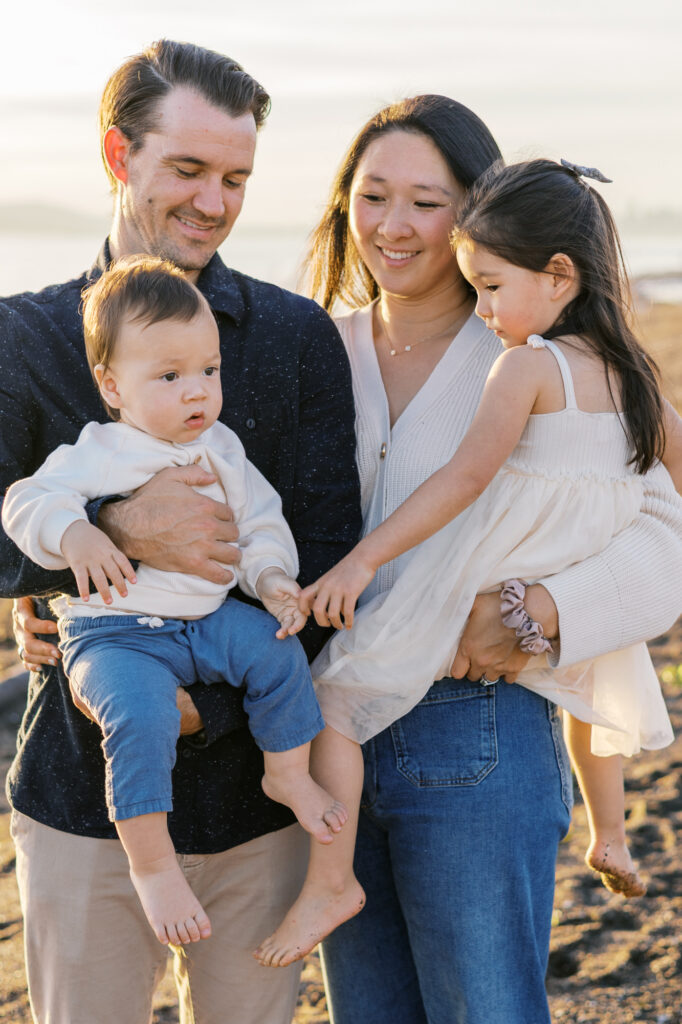 family of four on Alameda Beach during their East Bay family photography session