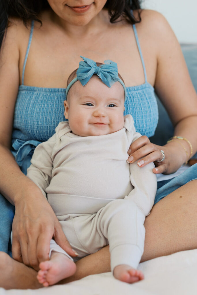 Smiling two month old baby in Alameda photographed by San Francisco Bay Area newborn photographer
