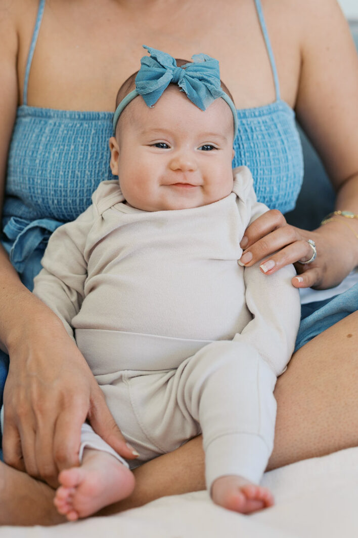 Smiling two month old baby photographed by San Francisco Bay Area newborn photographer