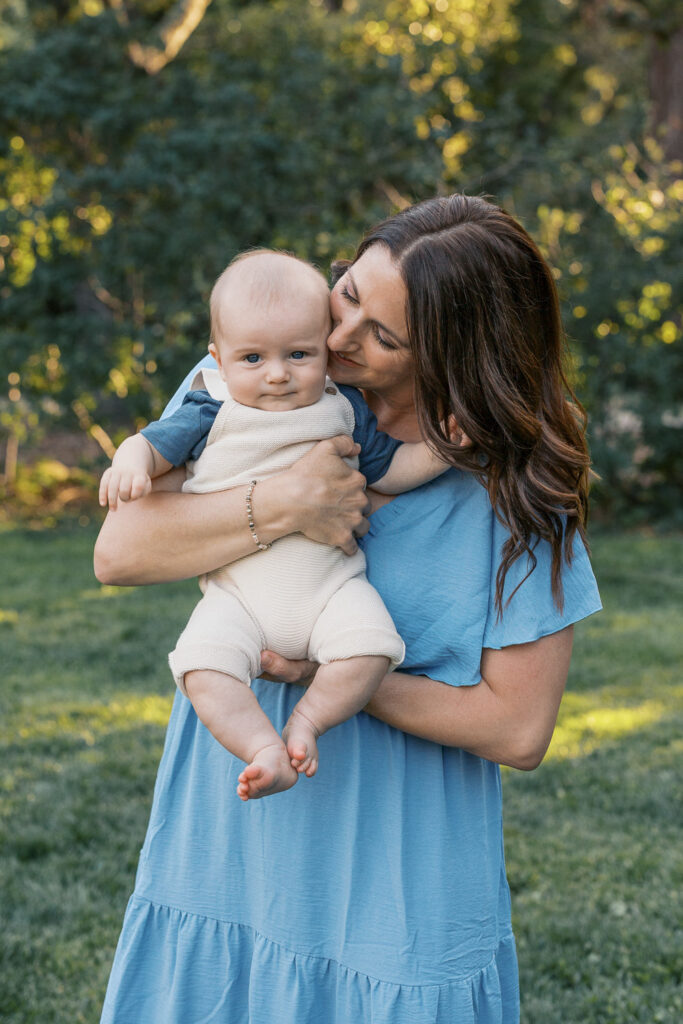 mom kisses baby boy during photography session in Piedmont