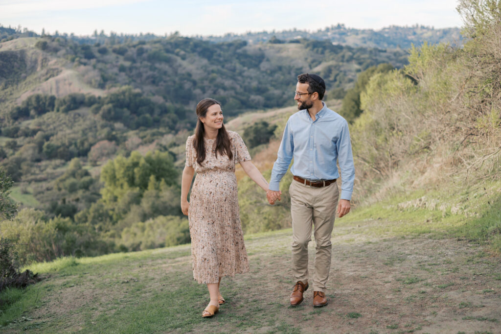 Lafayette couple walk in the Lafayette hills during their Bay Area maternity photography session