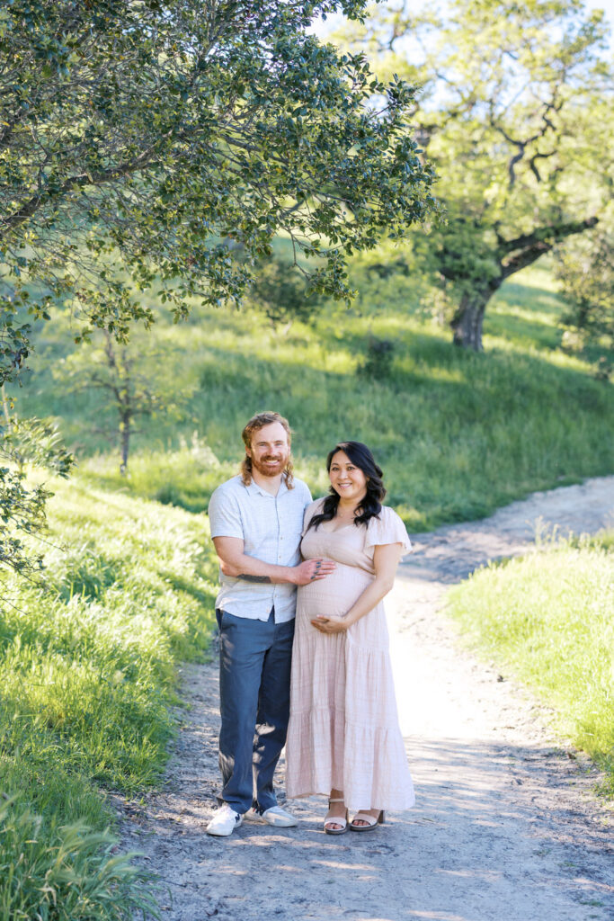 couple pose during their maternity photography session in Walnut Creek