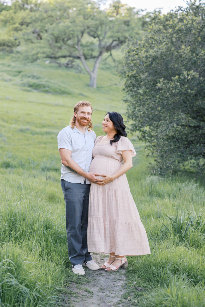 couple on a trail in Walnut Creek during their Bay Area maternity session