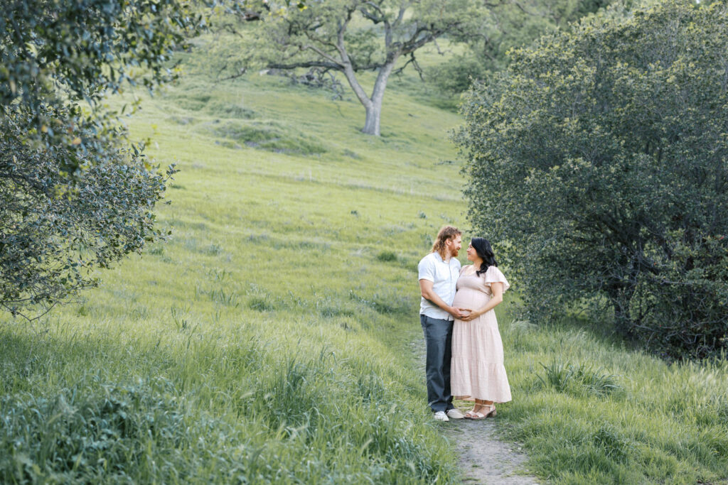 couple in Walnut Creek on a trail in Old Borges Ranch for their maternity photography session in the Bay Area